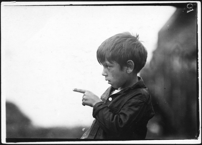 -I_nearly_cut_my_finger_off,_cutting_sardines_the_other_day.-_7_year_old_Byron._Eastport,_Me._-_NARA_-_523459